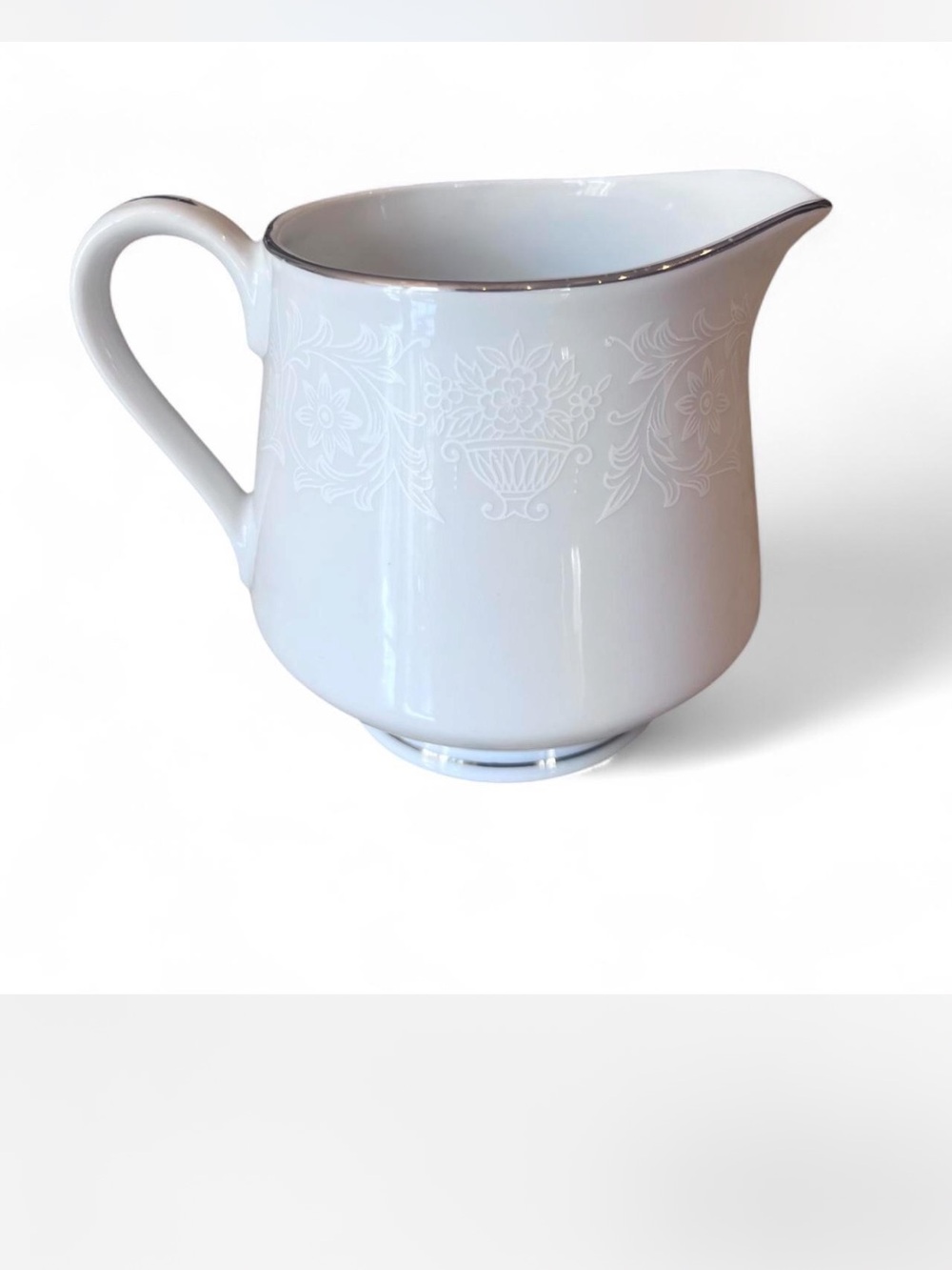 Vintage Crown Victoria Lovelace China creamer with Silver Trim